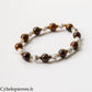 Pulsera Aphaia – Ojo de Tigre (8 mm) y Howlita (6 mm) - 17 cm | Serenidad y Determinación